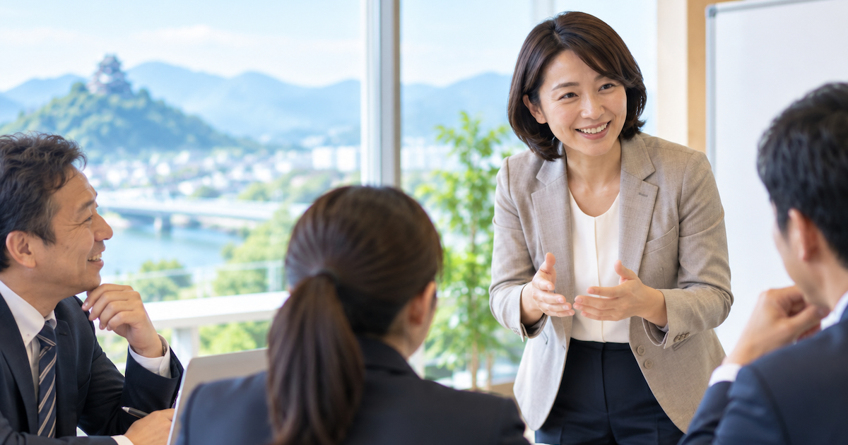 企業研修で講師と参加者が対話する様子